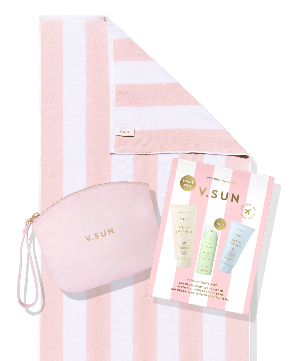 Produktabbildung V.SUN Travel Set mit rosa Kosmetiktasche, gestreiftem Handtuch und Sonnenschutz-Produkten.